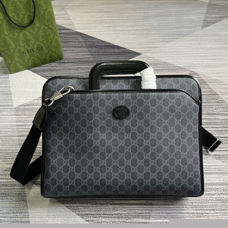 G*u*i top handle bags